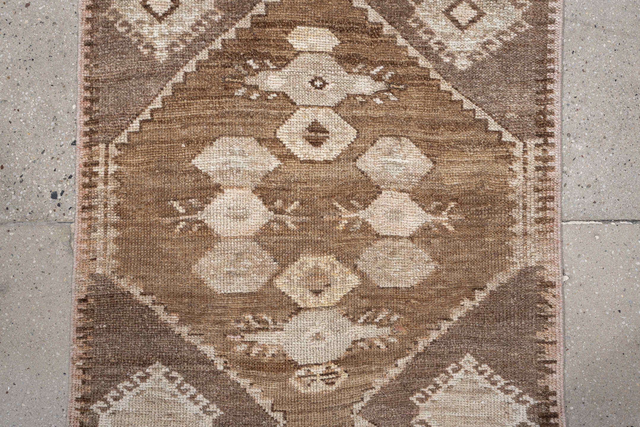 2' x 10' one-of-a-kind handmade antique Kars runner rug. Color palette: taupe, camel, brown, ivory, cream, beige, gray