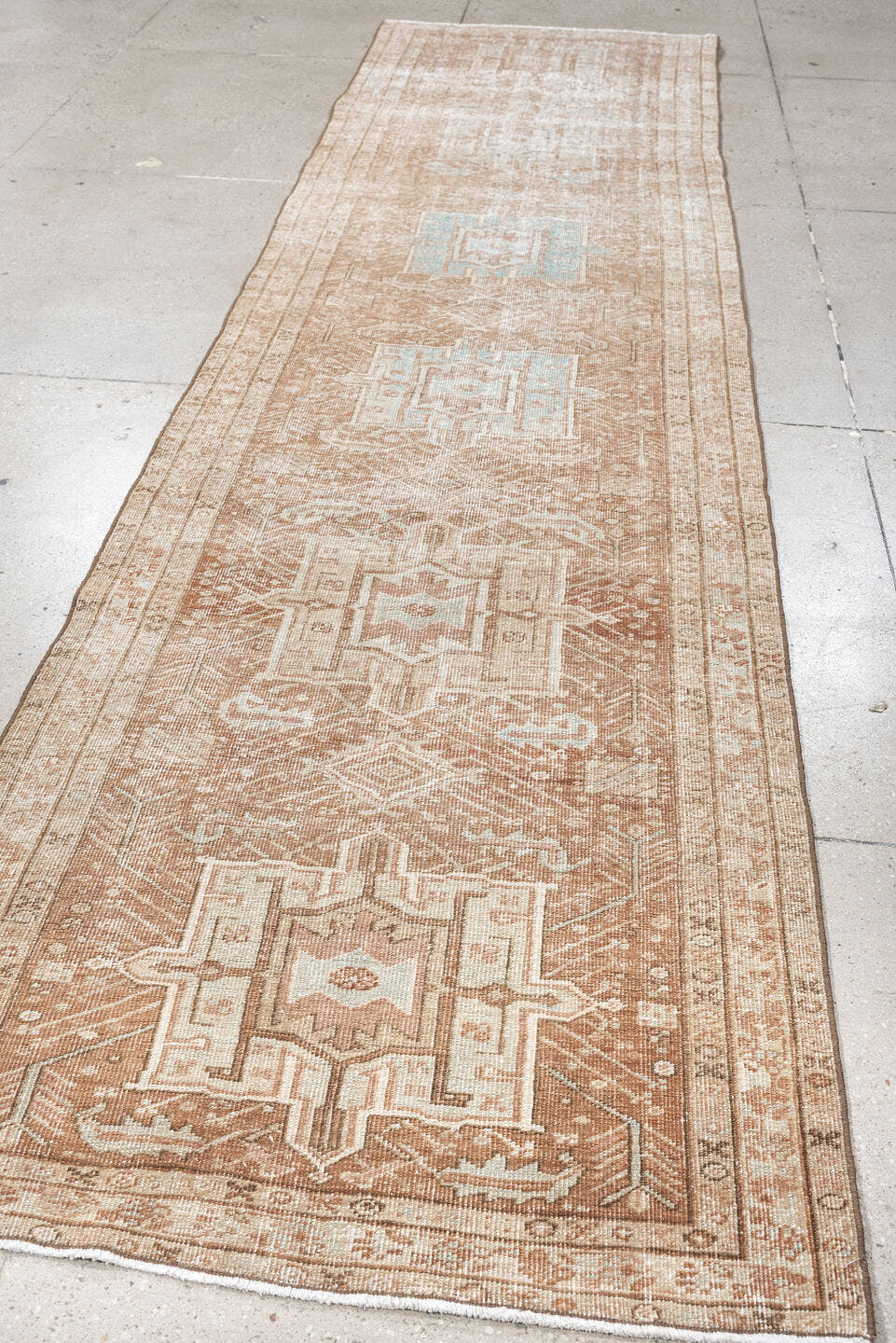 3' x 12' one-of-a-kind handmade vintage Heriz runner rug. Color palette: blush, ivory, pale blue, taupe, camel, pink