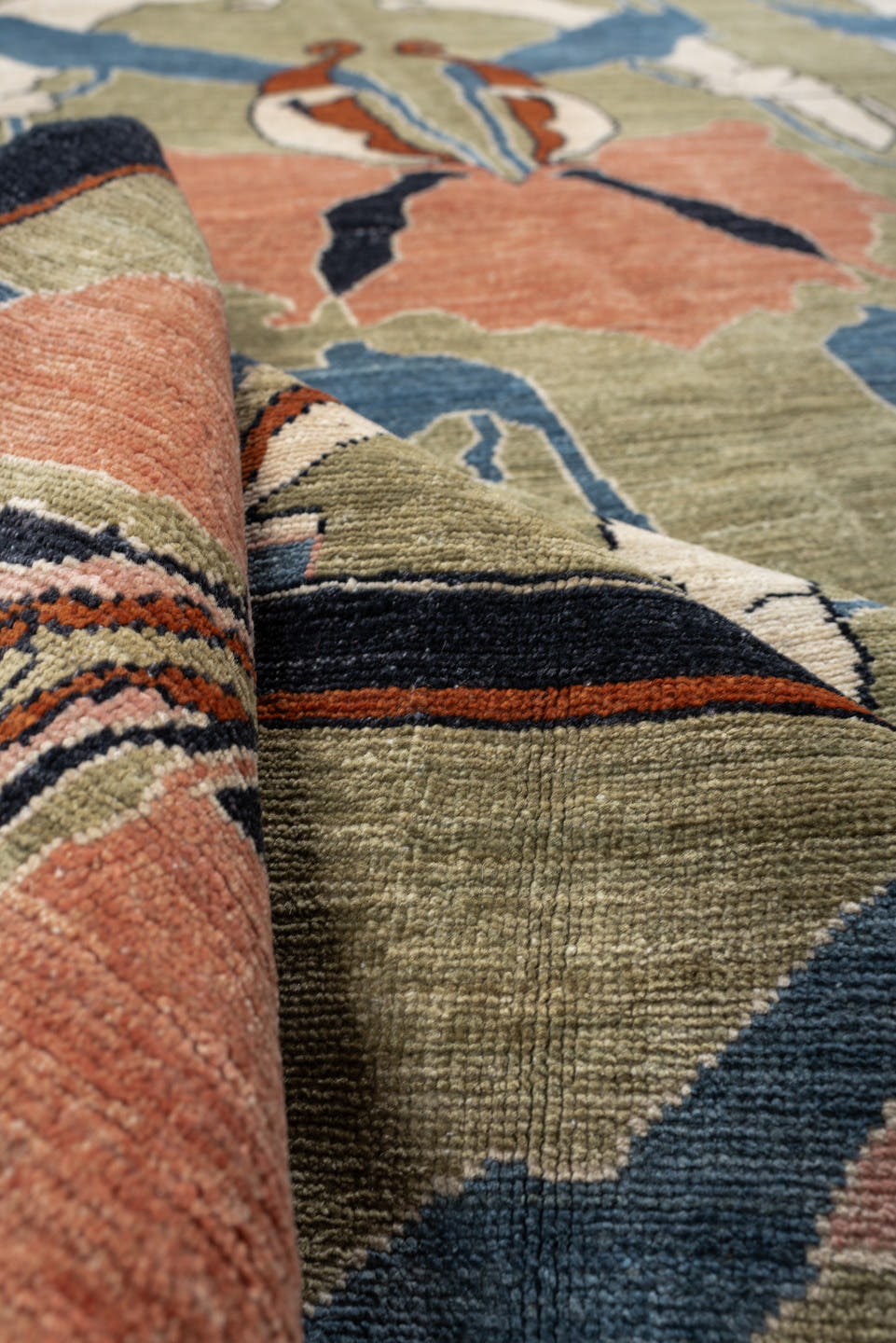 9' x 12' one-of-a-kind handmade vintage Afghan large size rug. Color palette: sage, salmon pink, ivory, blue gray, navy