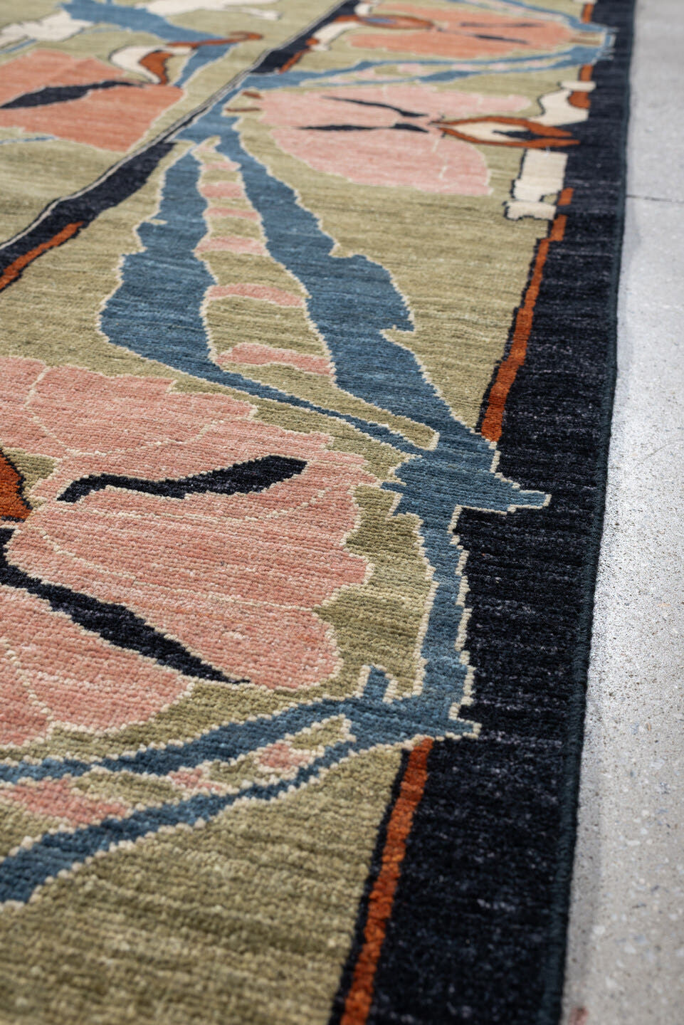 9' x 12' one-of-a-kind handmade vintage Afghan large size rug. Color palette: sage, salmon pink, ivory, blue gray, navy