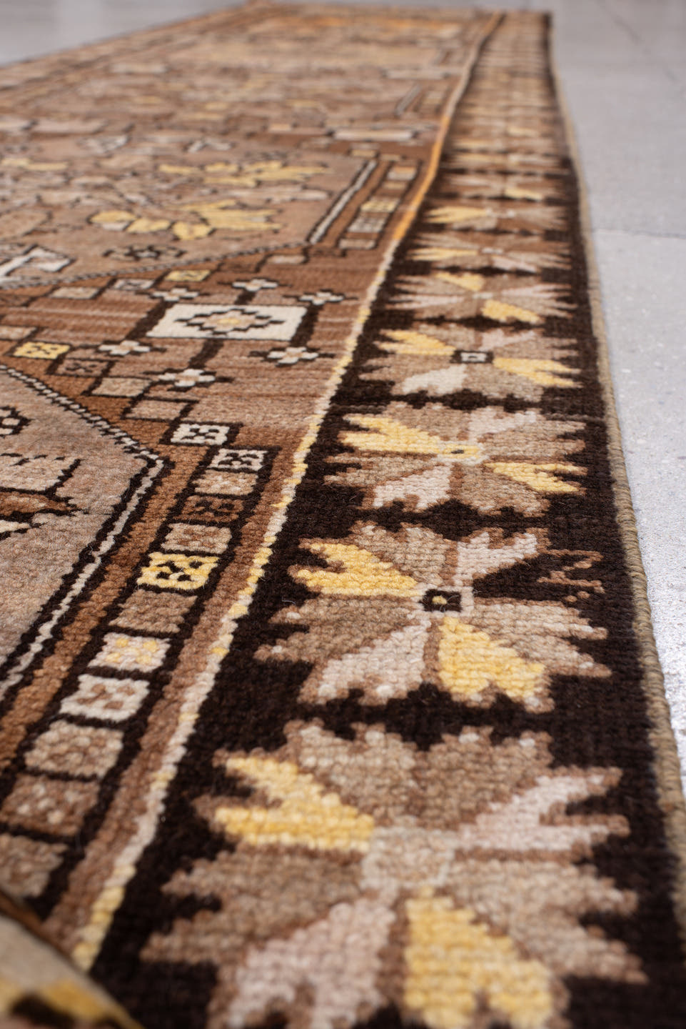 2' x 13' one-of-a-kind handmade antique Anatolian runner rug. Color palette: camel, brown, ivory, saffron, taupe, rose