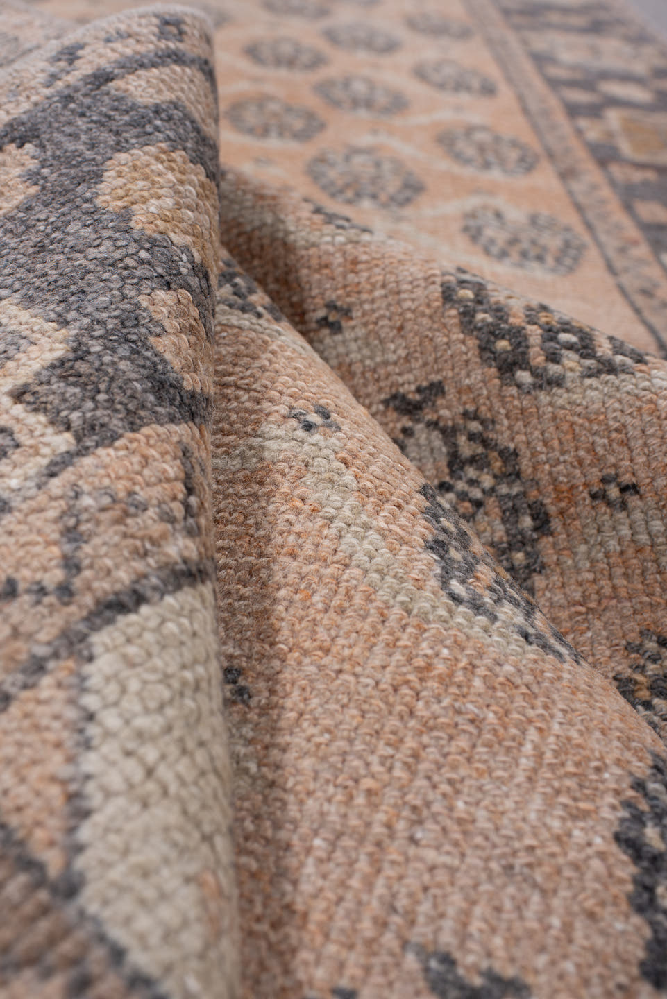 3' x 12' one-of-a-kind handmade antique Anatolian runner rug. Color palette: camel, charcoal, ivory, taupe, tan, slate