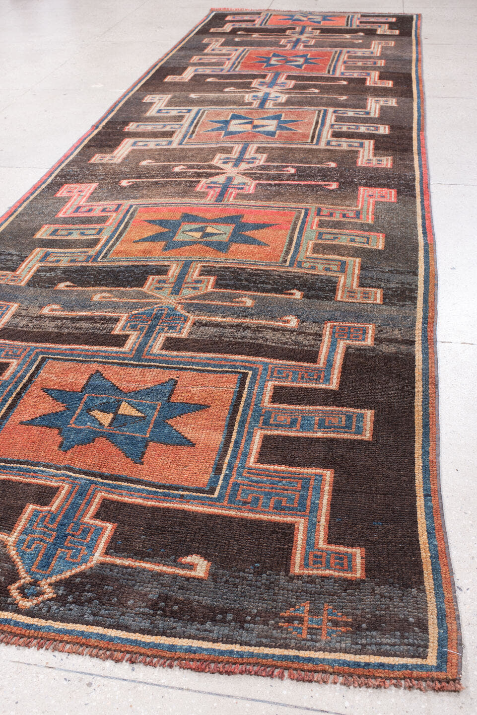 4' x 15' one-of-a-kind handmade antique Kars runner rug. Color palette: charcoal, rust, teal, ivory, terracotta, coral