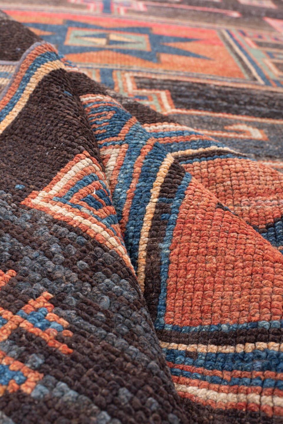 4' x 15' one-of-a-kind handmade antique Kars runner rug. Color palette: charcoal, rust, teal, ivory, terracotta, coral