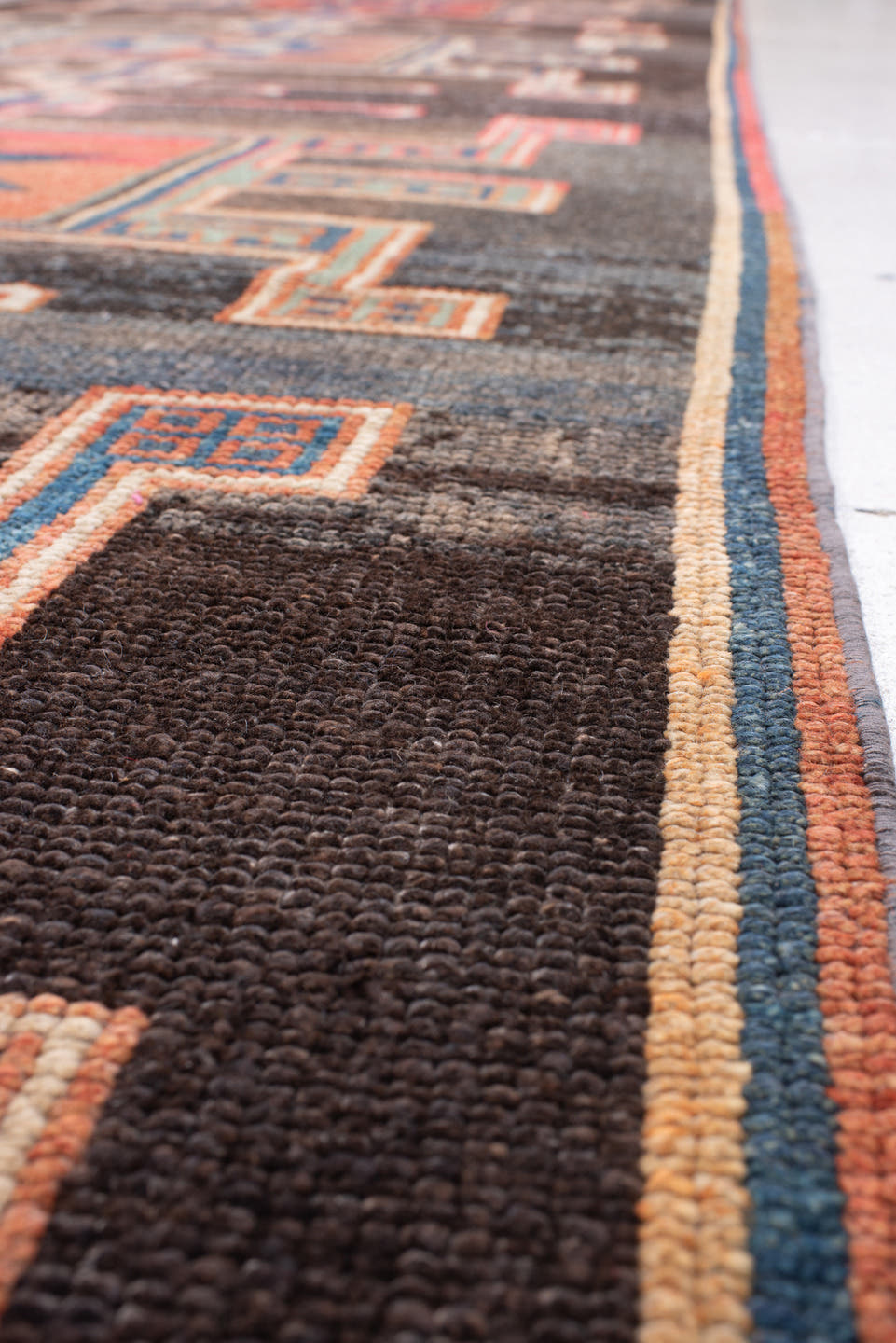 4' x 15' one-of-a-kind handmade antique Kars runner rug. Color palette: charcoal, rust, teal, ivory, terracotta, coral