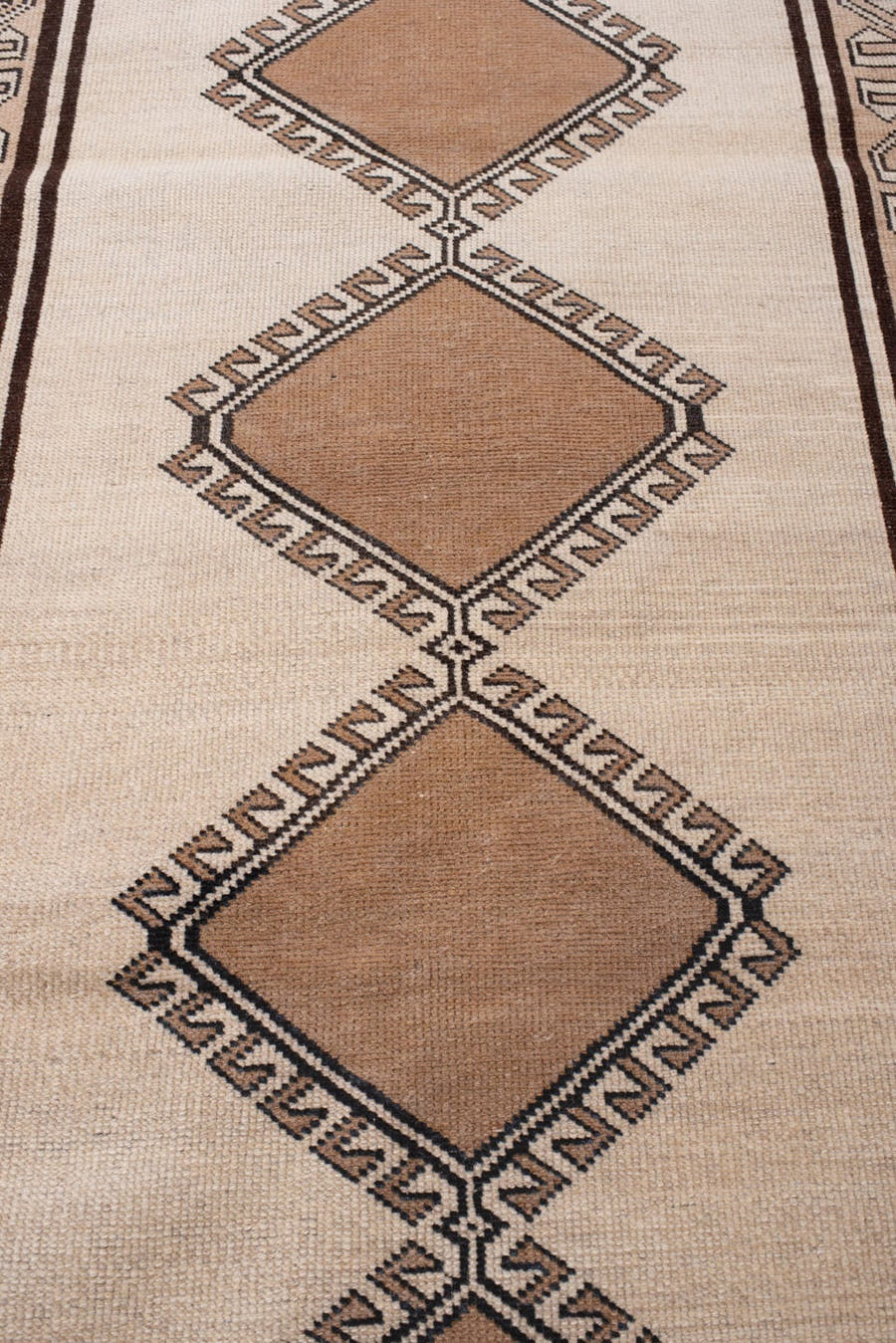 3' x 6' one-of-a-kind handmade antique Anatolian rug. Color palette: ivory, camel, dark brown, taupe, charcoal, beige, brown