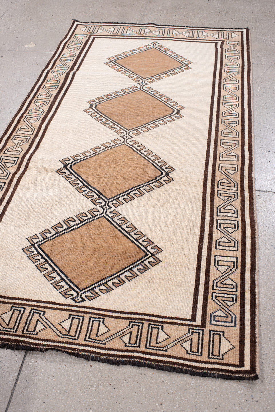 3' x 6' one-of-a-kind handmade antique Anatolian rug. Color palette: ivory, camel, dark brown, taupe, charcoal, beige, brown