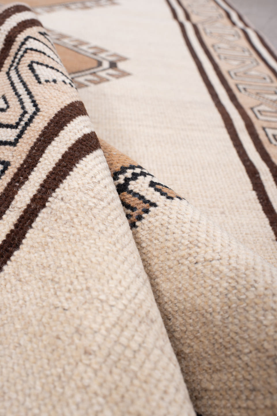 3' x 6' one-of-a-kind handmade antique Anatolian rug. Color palette: ivory, camel, dark brown, taupe, charcoal, beige, brown