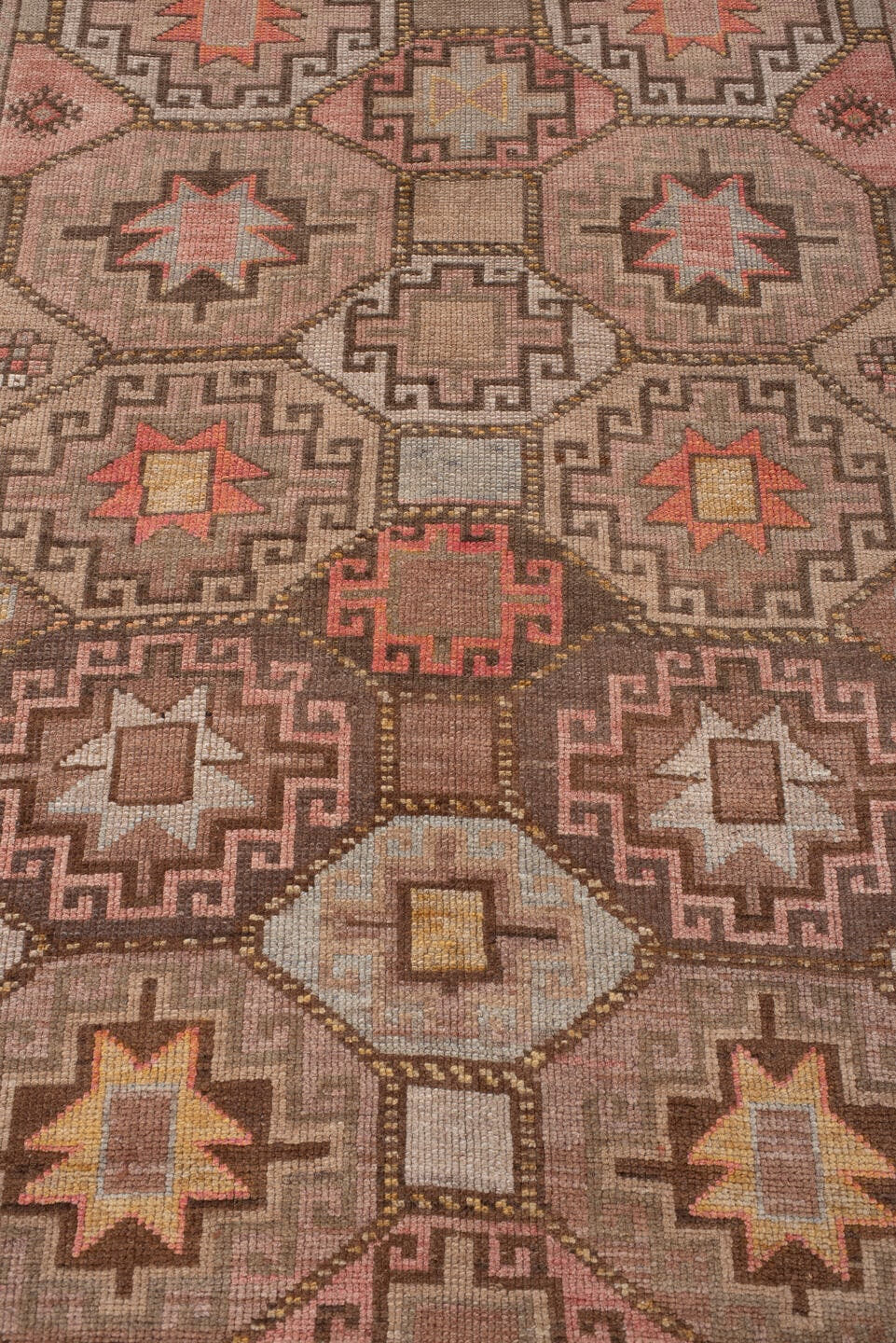 4' x 11' one-of-a-kind handmade antique Anatolian runner rug. Color palette: camel, taupe, rose, rust, charcoal, ivory