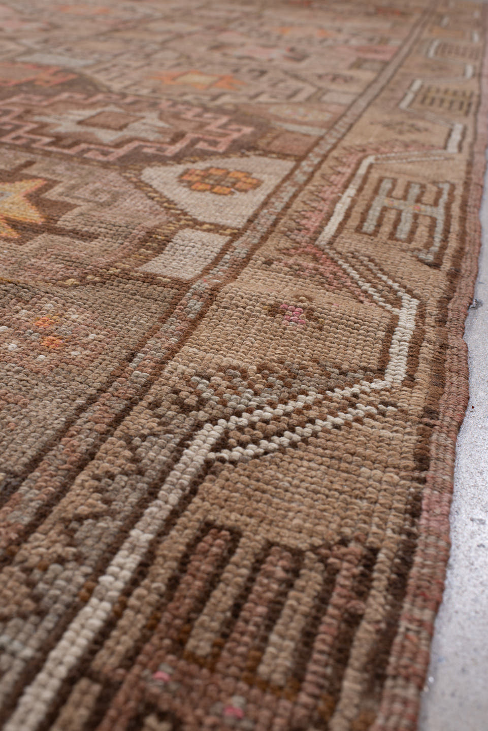 4' x 11' one-of-a-kind handmade antique Anatolian runner rug. Color palette: camel, taupe, rose, rust, charcoal, ivory