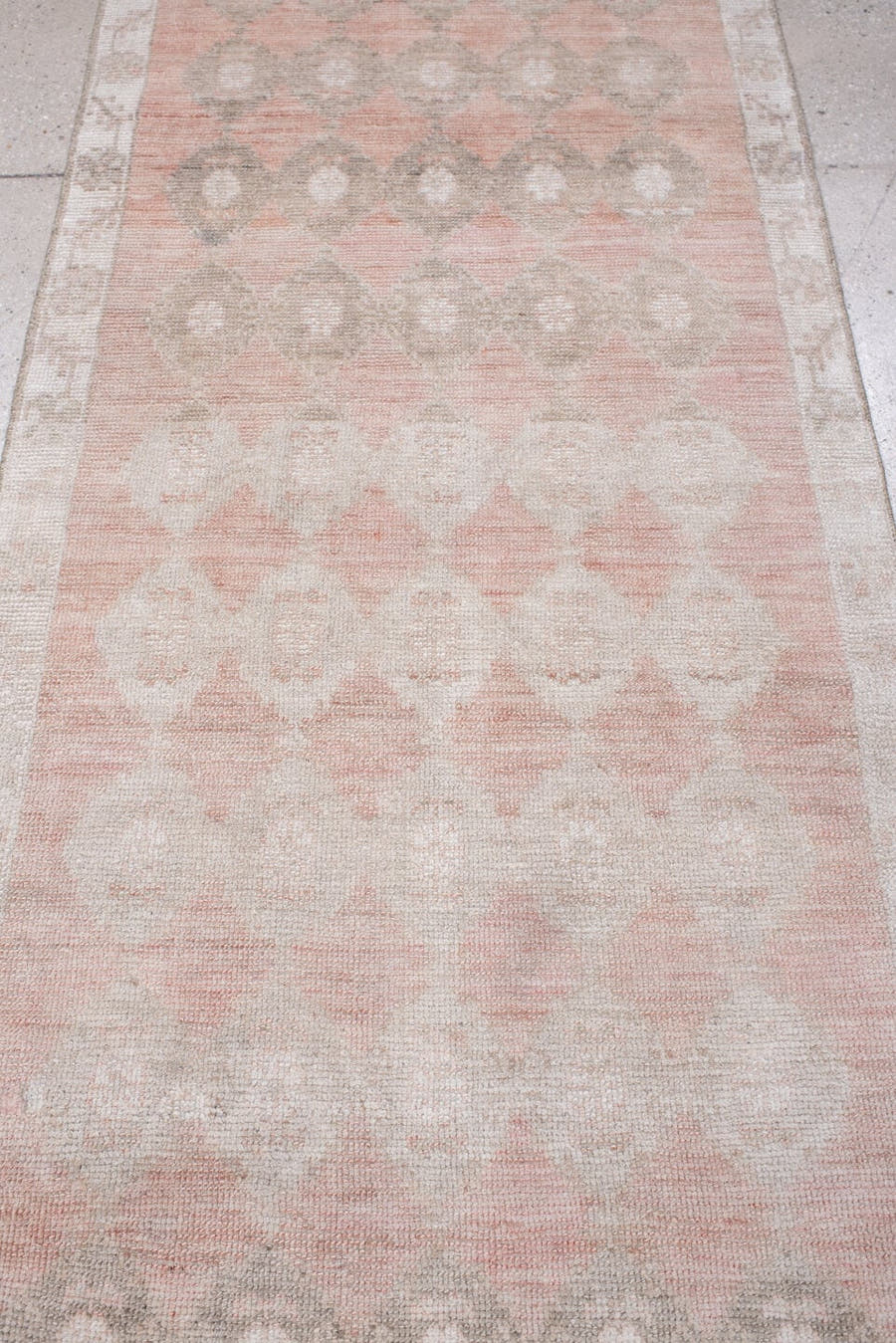 2' x 9' one-of-a-kind handmade antique Anatolian runner rug. Color palette: blush, ivory, taupe, warm gray, sand, rose