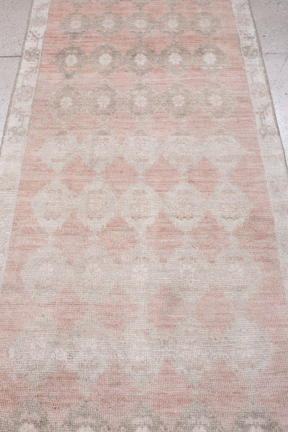 2' x 9' one-of-a-kind handmade antique Anatolian runner rug. Color palette: blush, ivory, taupe, warm gray, sand, rose