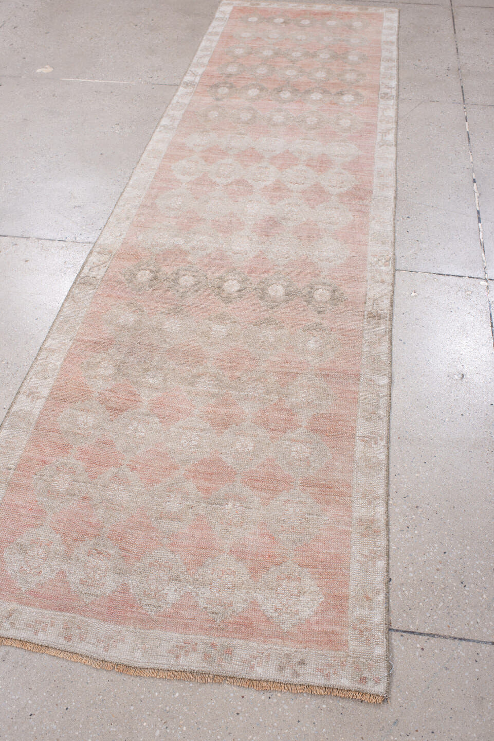 2' x 9' one-of-a-kind handmade antique Anatolian runner rug. Color palette: blush, ivory, taupe, warm gray, sand, rose