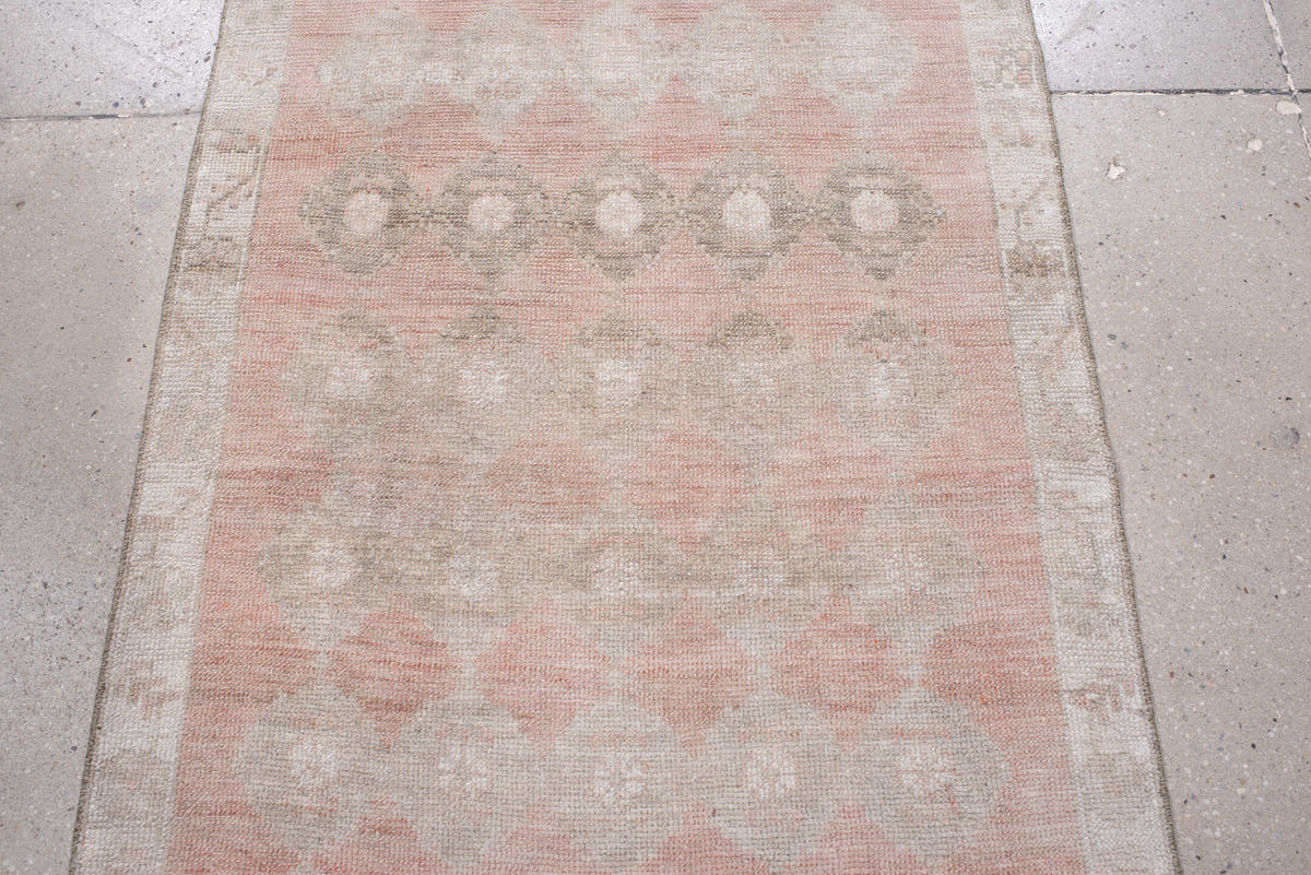 2' x 9' one-of-a-kind handmade antique Anatolian runner rug. Color palette: blush, ivory, taupe, warm gray, sand, rose