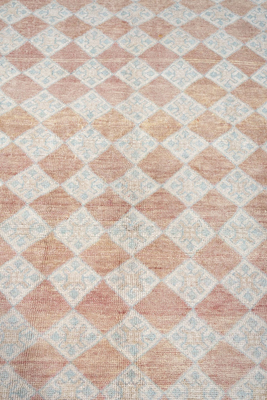 6' x 8' one-of-a-kind handmade antique Anatolian medium size rug. Color palette: terracotta, ivory, pale blue, blush, taupe