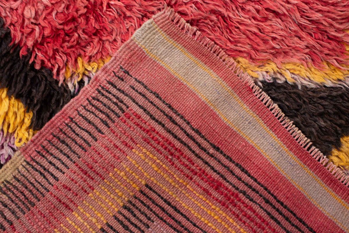 4' x 8' one-of-a-kind handmade antique Tulu rug. Color palette: crimson, dark brown, saffron, lavender, rose, coral, ivory