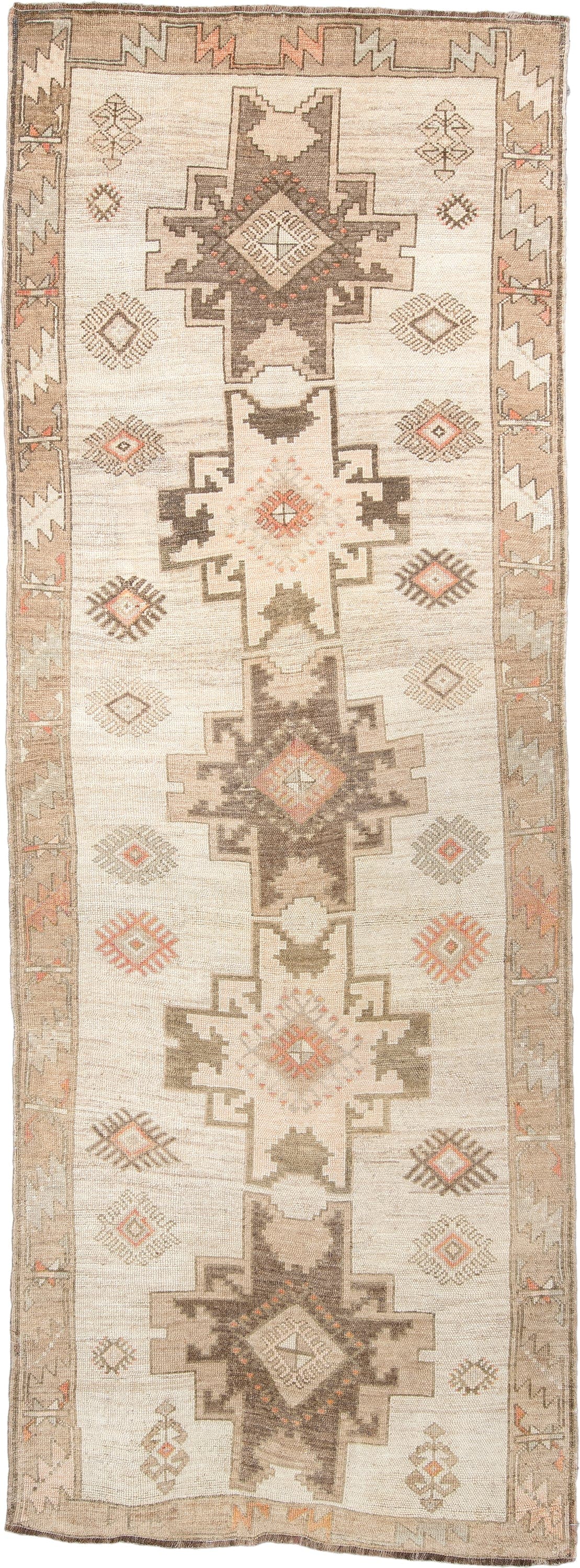 4' x 10' one-of-a-kind handmade antique Anatolian runner rug. Color palette: ivory, taupe, charcoal, camel, coral, rose