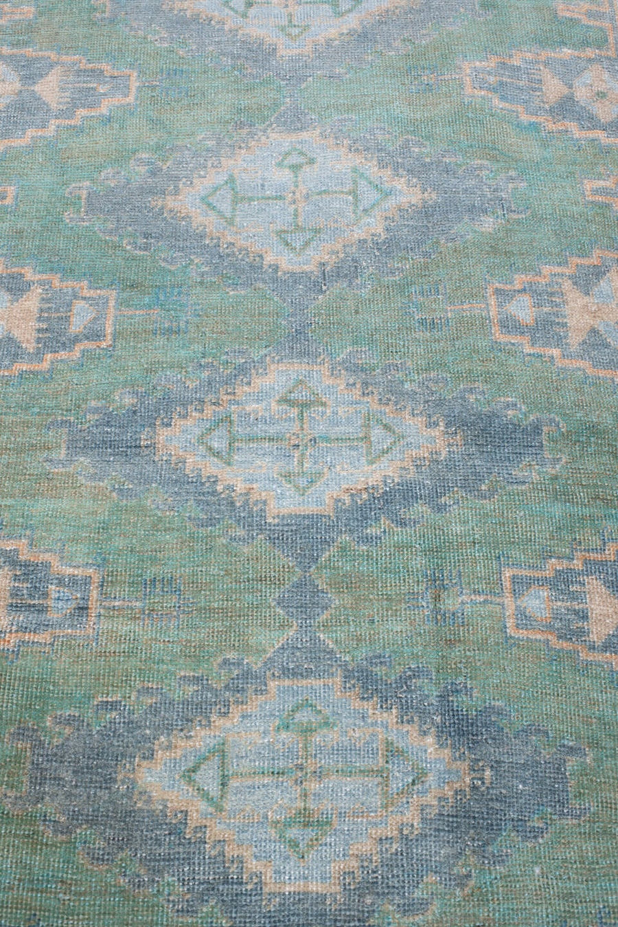 3' x 6' one-of-a-kind handmade antique Veece rug. Color palette: turquoise, blue gray, ivory, peach, sage, taupe, teal, gray