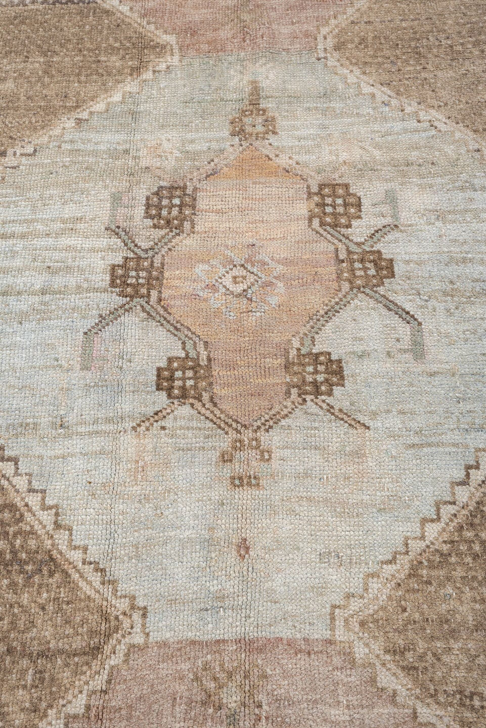 5' x 10' one-of-a-kind handmade antique Kars large size rug. Color palette: taupe, ivory, blush, sage, camel, charcoal, rose