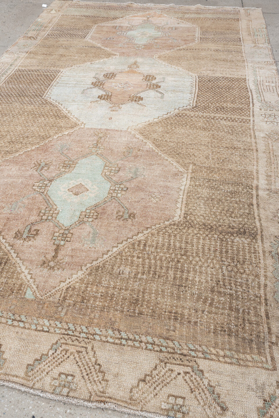 5' x 10' one-of-a-kind handmade antique Kars large size rug. Color palette: taupe, ivory, blush, sage, camel, charcoal, rose