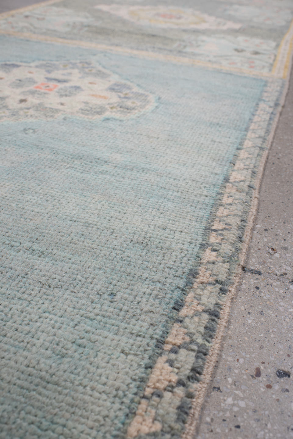 2' x 32' one-of-a-kind handmade vintage Oushak runner rug. Color palette: sage, aqua, ivory, terracotta, ochre, coral