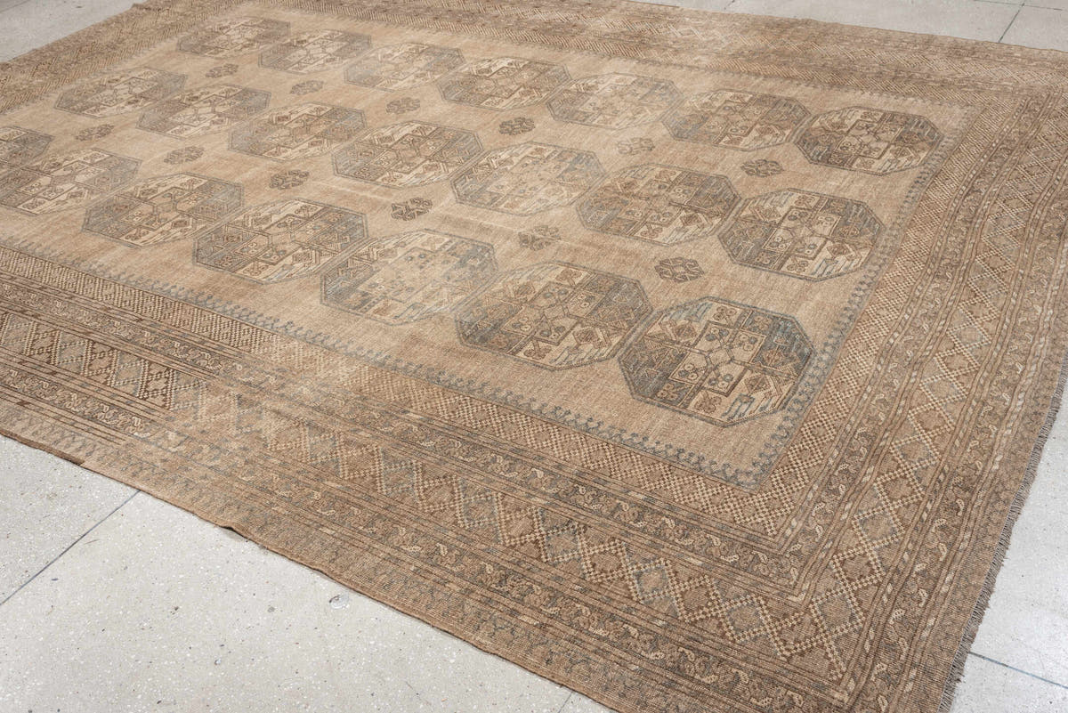 9' x 12' one-of-a-kind handmade antique Afghan large size rug. Color palette: camel, taupe, slate, ivory, brown, charcoal