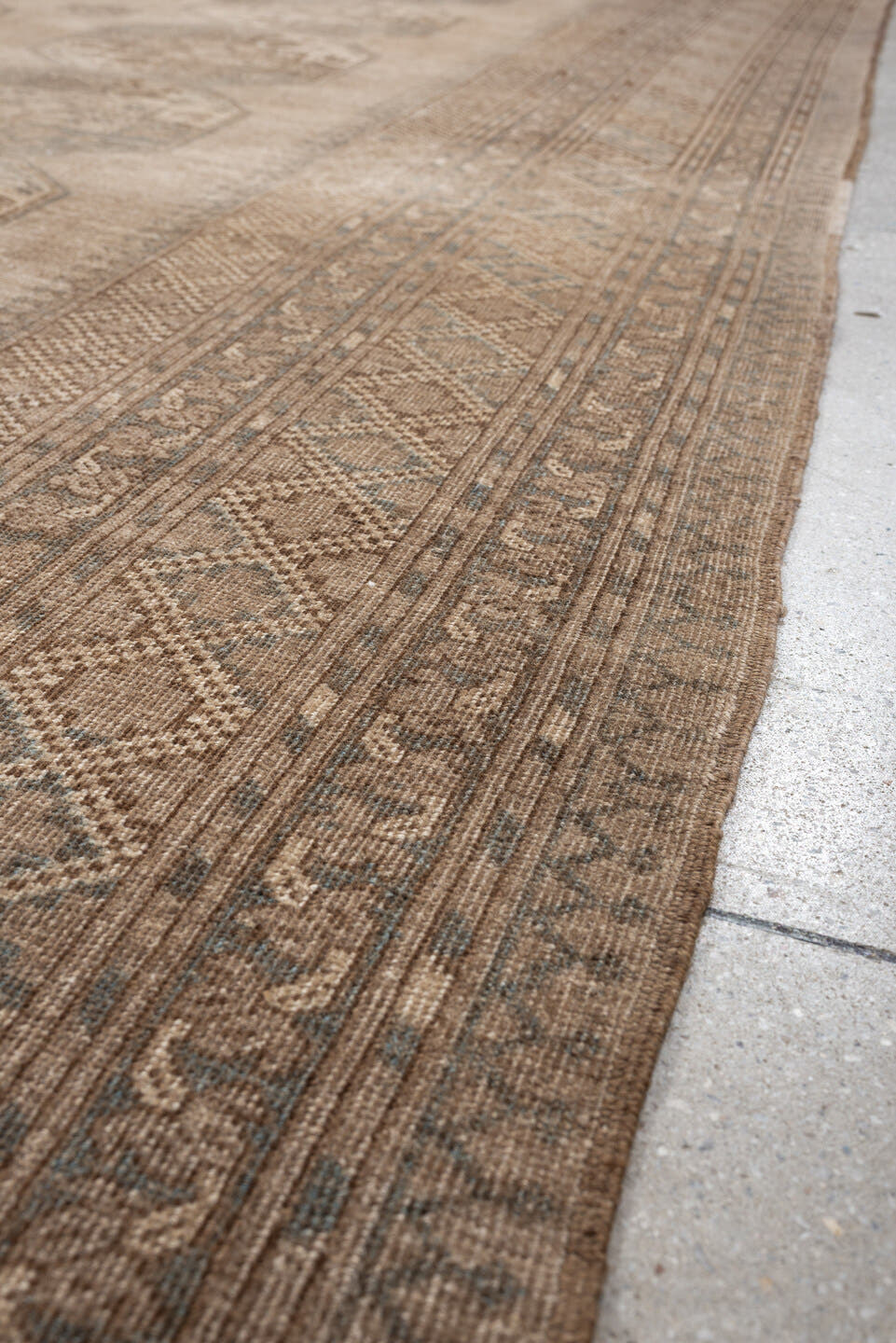 9' x 12' one-of-a-kind handmade antique Afghan large size rug. Color palette: camel, taupe, slate, ivory, brown, charcoal