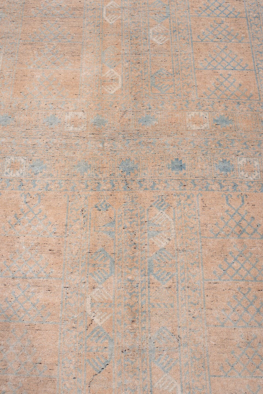 4' x 6' one-of-a-kind handmade antique Afghan rug. Color palette: peach, powder blue, ivory, taupe, camel, slate, terracotta
