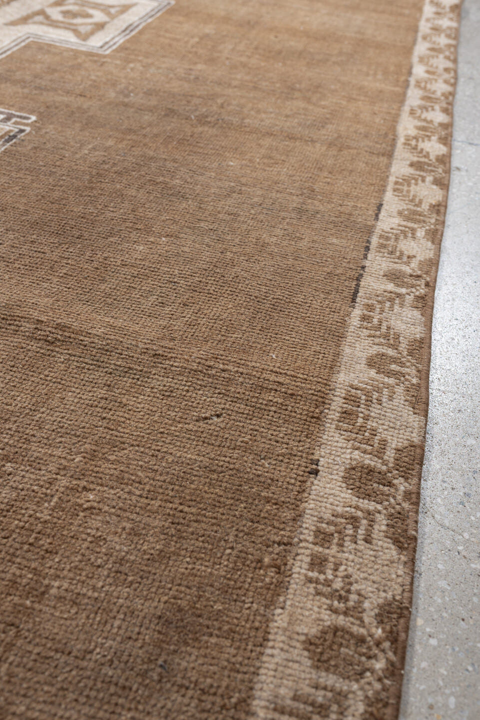 6' x 9' one-of-a-kind handmade antique Kars medium size rug. Color palette: camel, taupe, ivory, brown, charcoal, sand