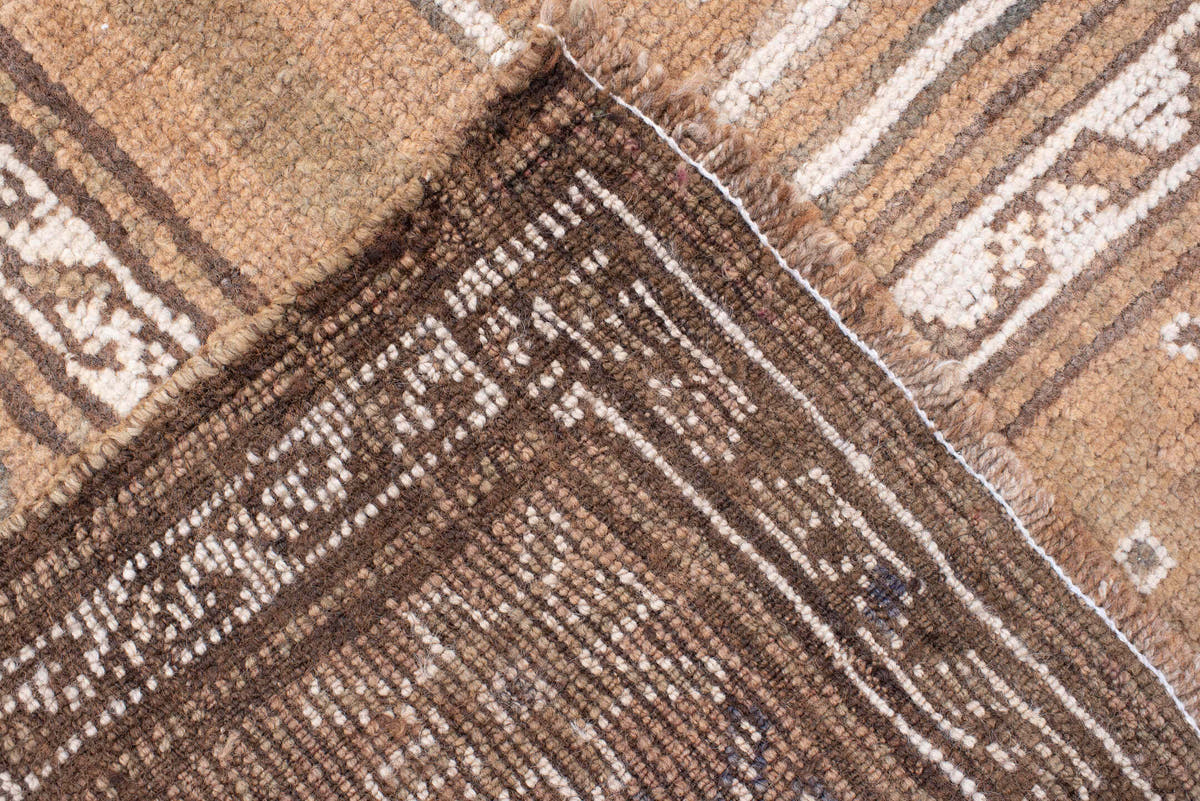 4' x 12' one-of-a-kind handmade antique Kars runner rug. Color palette: camel, taupe, ivory, brown, beige, charcoal, gray