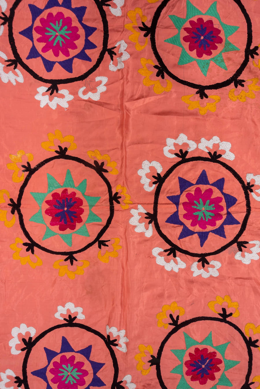 7' x 7' one-of-a-kind handmade vintage Suzani rug. Color palette: coral, black, teal, violet, white, gold, crimson
