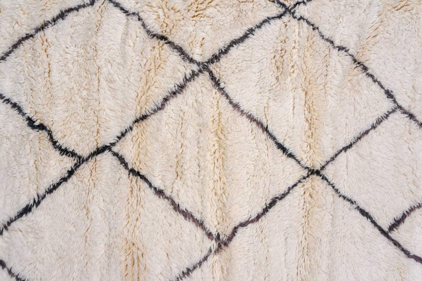 Cream and brown handmade vintage Moroccan area rug