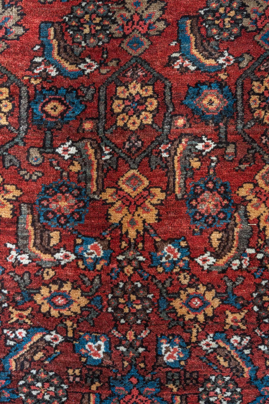 4' x 6' one-of-a-kind handmade vintage Kurd small size rug. Color palette: red, ivory, indigo, rust, navy, camel, burgundy