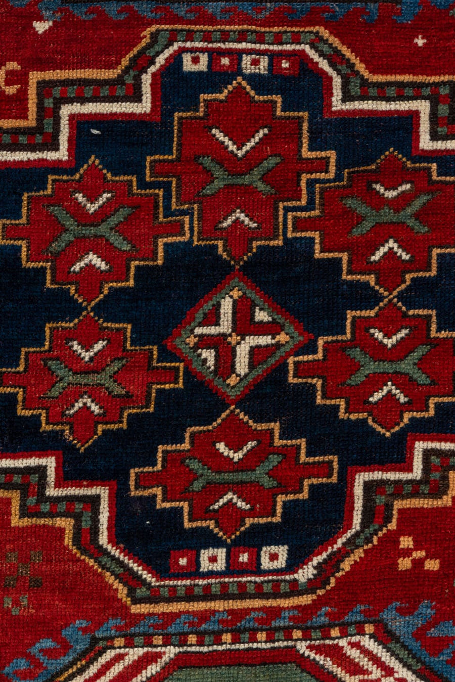 5' x 7' one-of-a-kind handmade vintage Kazak rug. Color palette: red, ivory, sky_blue, navy, brown, sage, camel, light blue