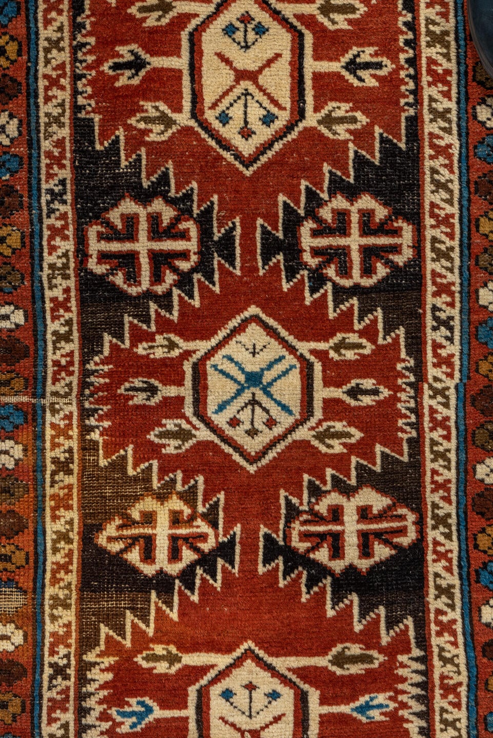 3' x 4' one-of-a-kind handmade vintage Shirvan small size rug. Color palette: rust, camel, ivory, black, sky blue