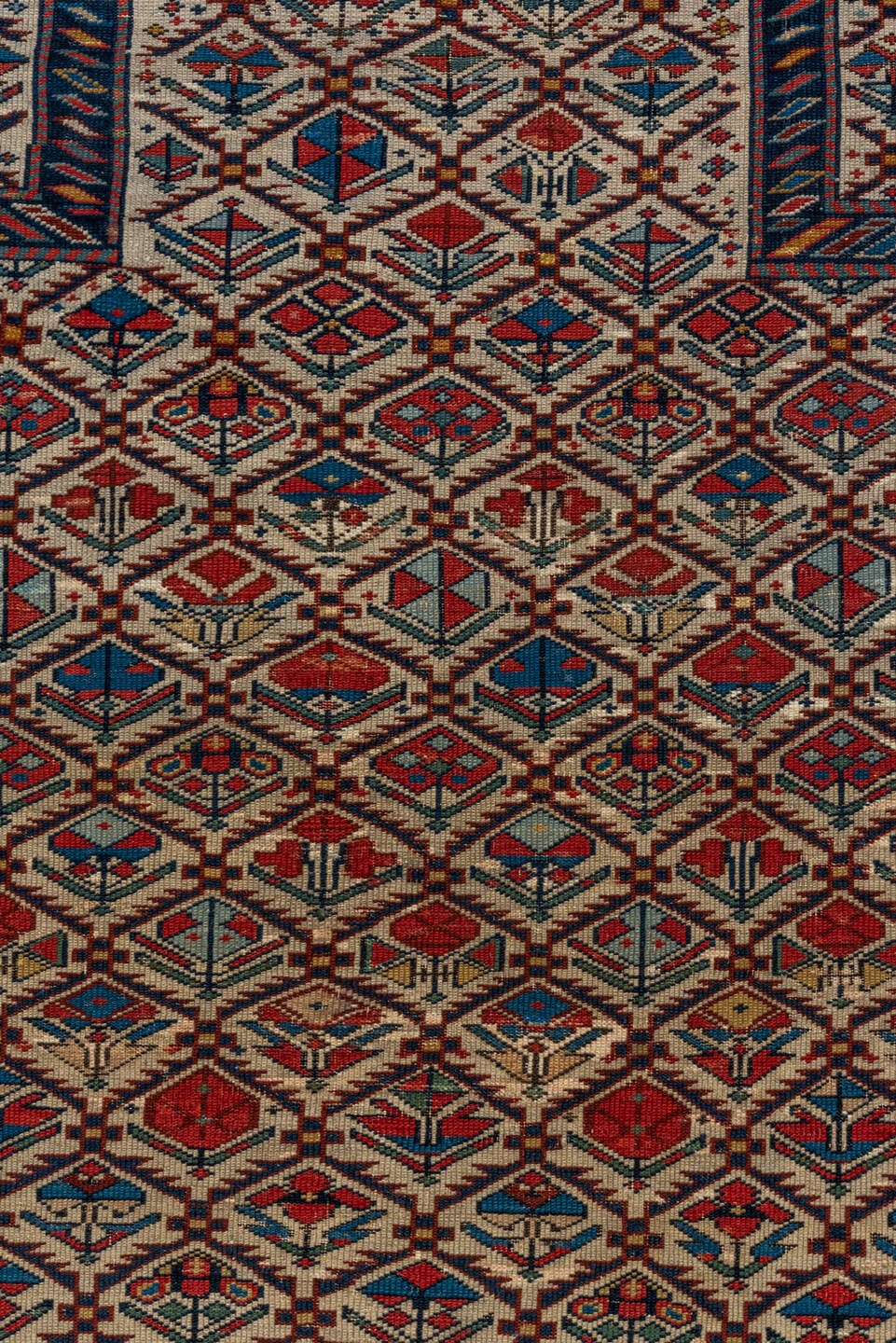 4' x 4' one-of-a-kind handmade vintage Shirvan small size rug. Color palette: ivory, navy, rust, sky blue, crimson, camel