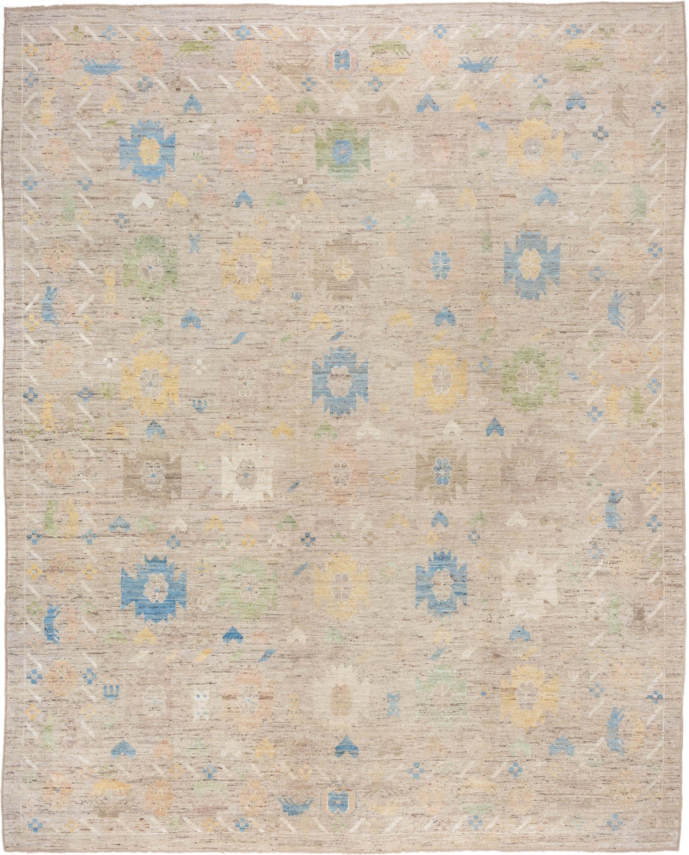 12' x 15' one-of-a-kind handmade vintage Tulu oversize rug. Color palette: beige, ivory, sky_blue, pale_yellow, sage, blush