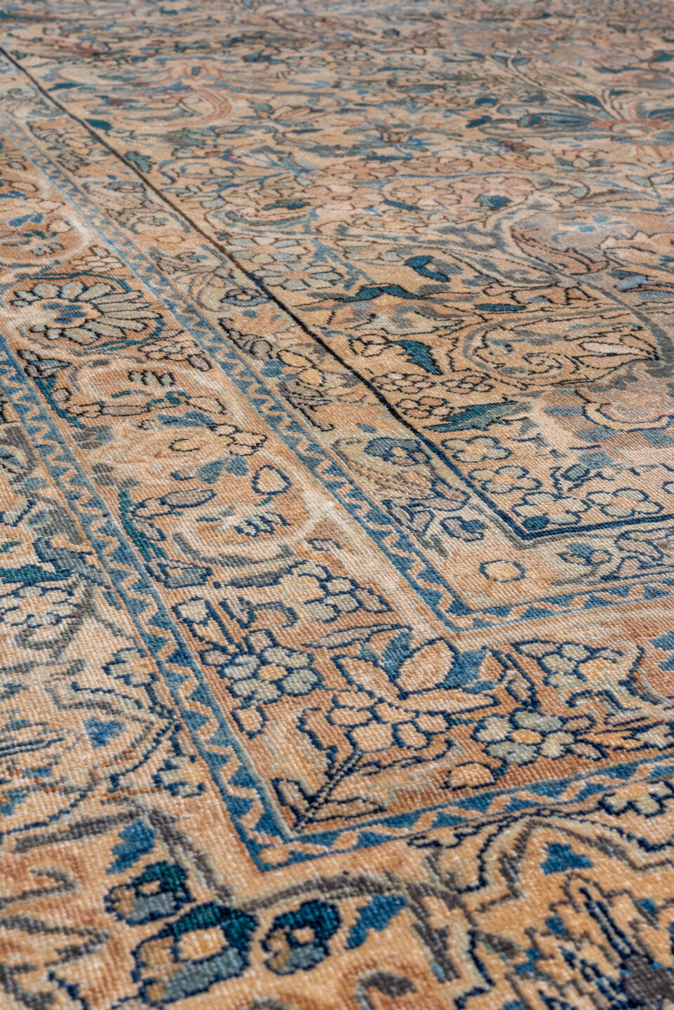 9' x 18' one-of-a-kind handmade vintage Kerman rug. Color palette: beige, ivory, muted blue, taupe, rust, camel, slate, blue