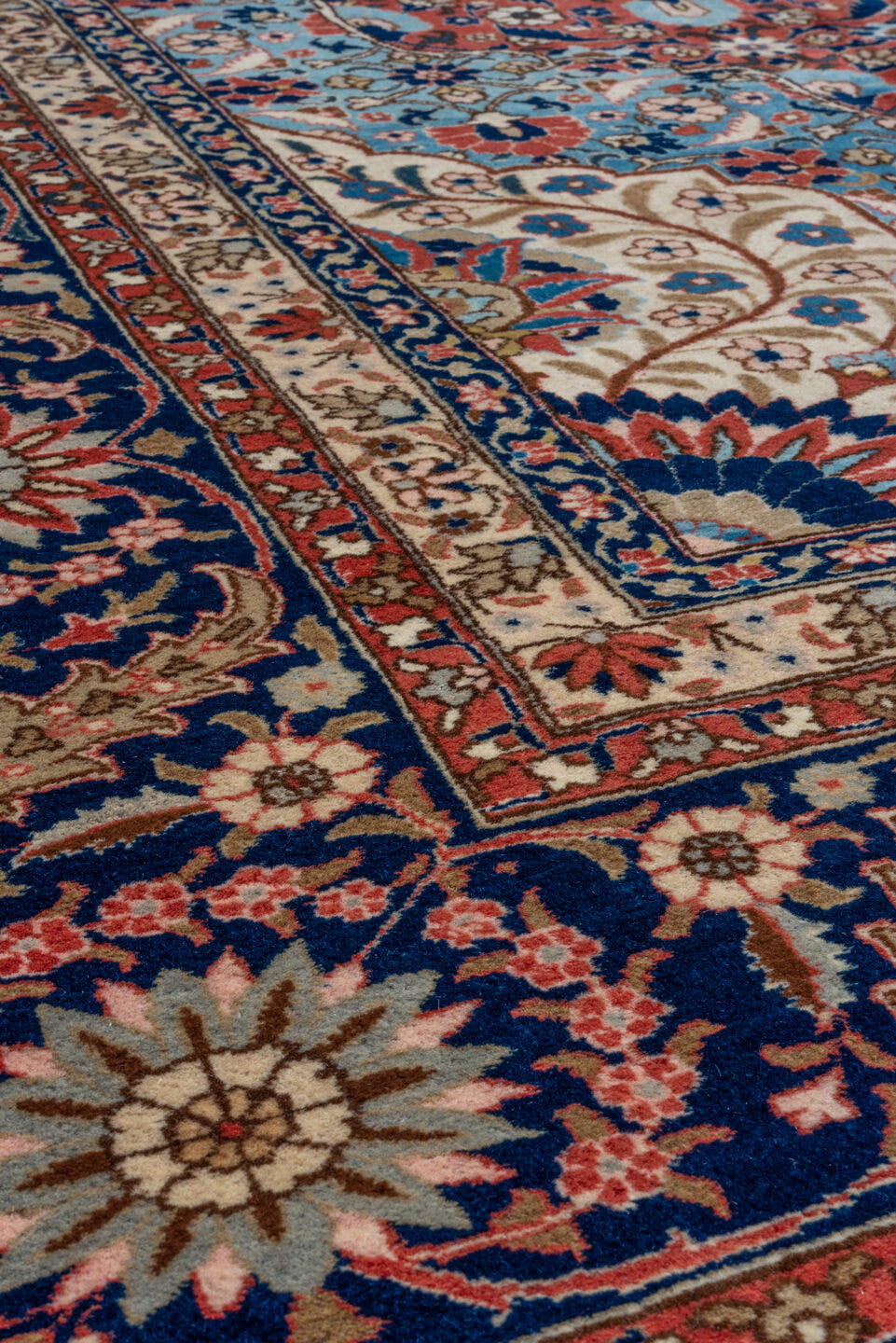 10' x 13' one-of-a-kind handmade vintage Tabriz oversize rug. Color palette: rust, navy, ivory, sky blue, cream, slate blue