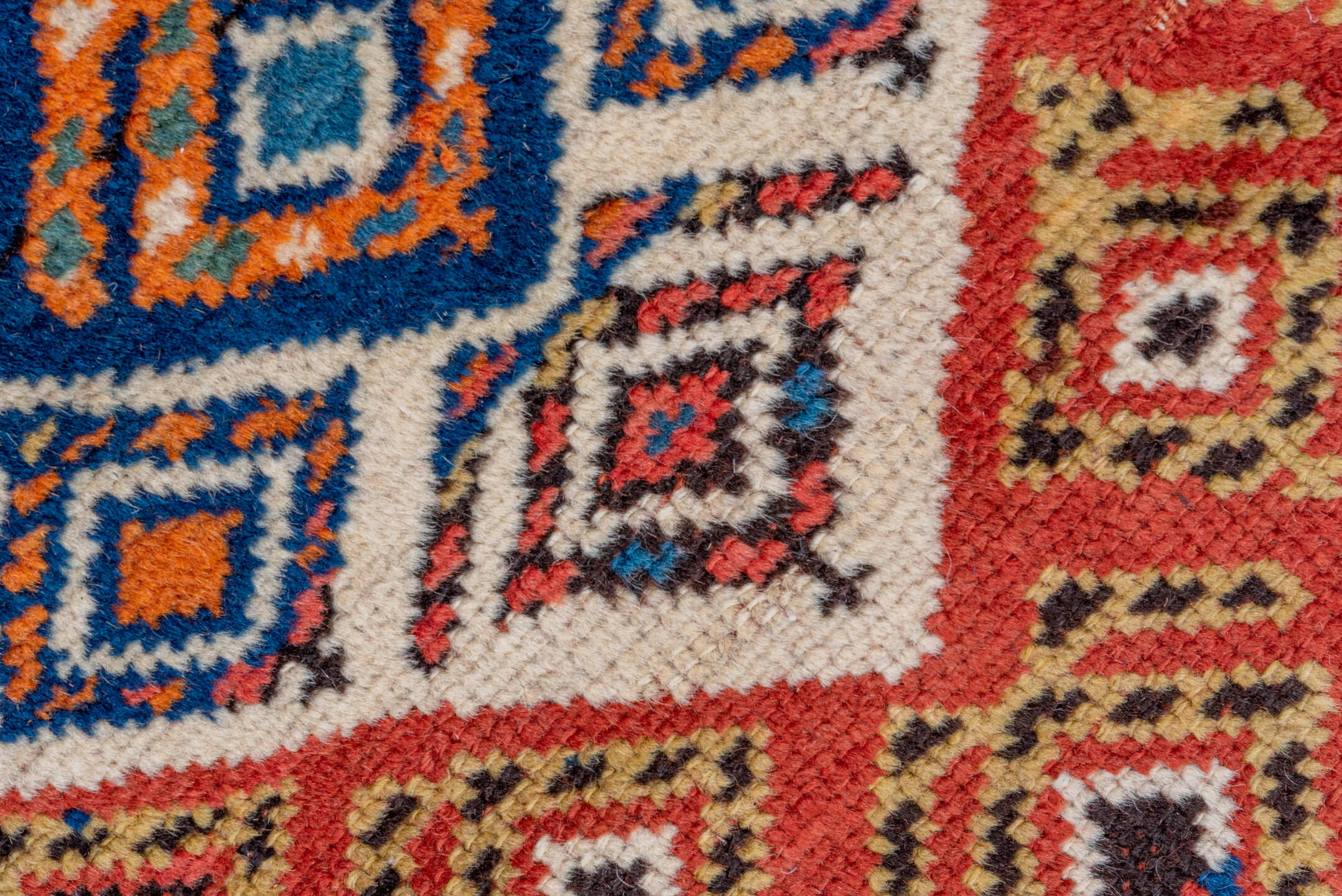 3' x 9' one-of-a-kind handmade vintage Genje runner rug. Color palette: rust, ivory, cobalt, navy, terra cotta, camel