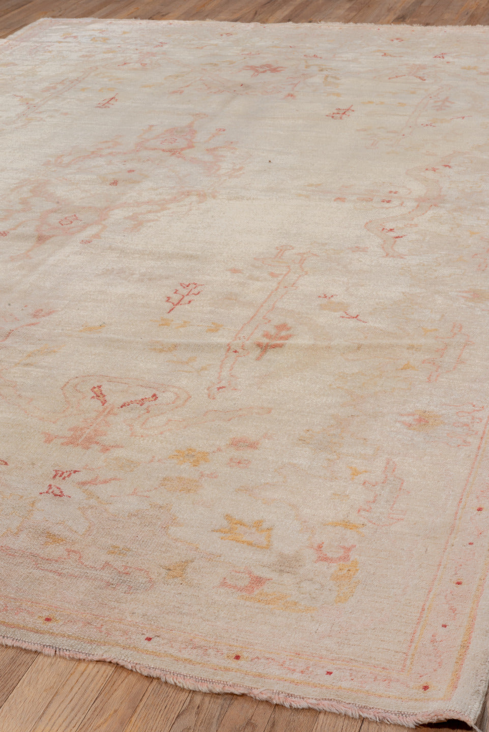 7' x 10' one-of-a-kind handmade vintage Oushak large size rug. Color palette: ivory, blush, peach, apricot, pale gold, rose