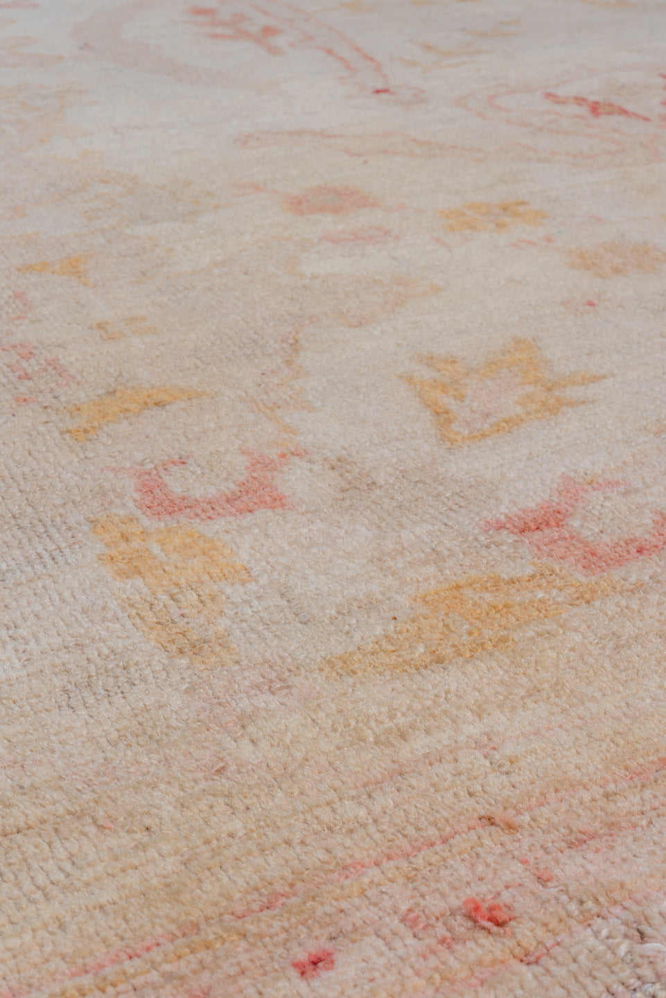 7' x 10' one-of-a-kind handmade vintage Oushak large size rug. Color palette: ivory, blush, peach, apricot, pale gold, rose