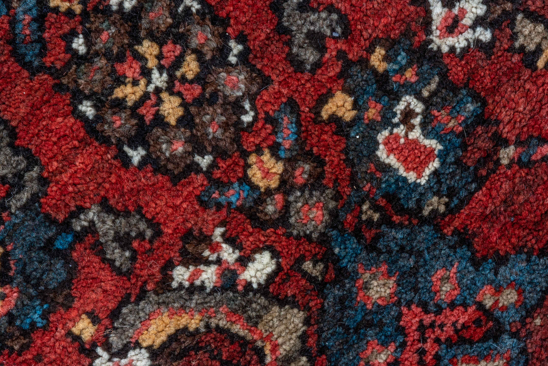 4' x 6' one-of-a-kind handmade vintage Kurd small size rug. Color palette: red, ivory, indigo, rust, navy, camel, burgundy