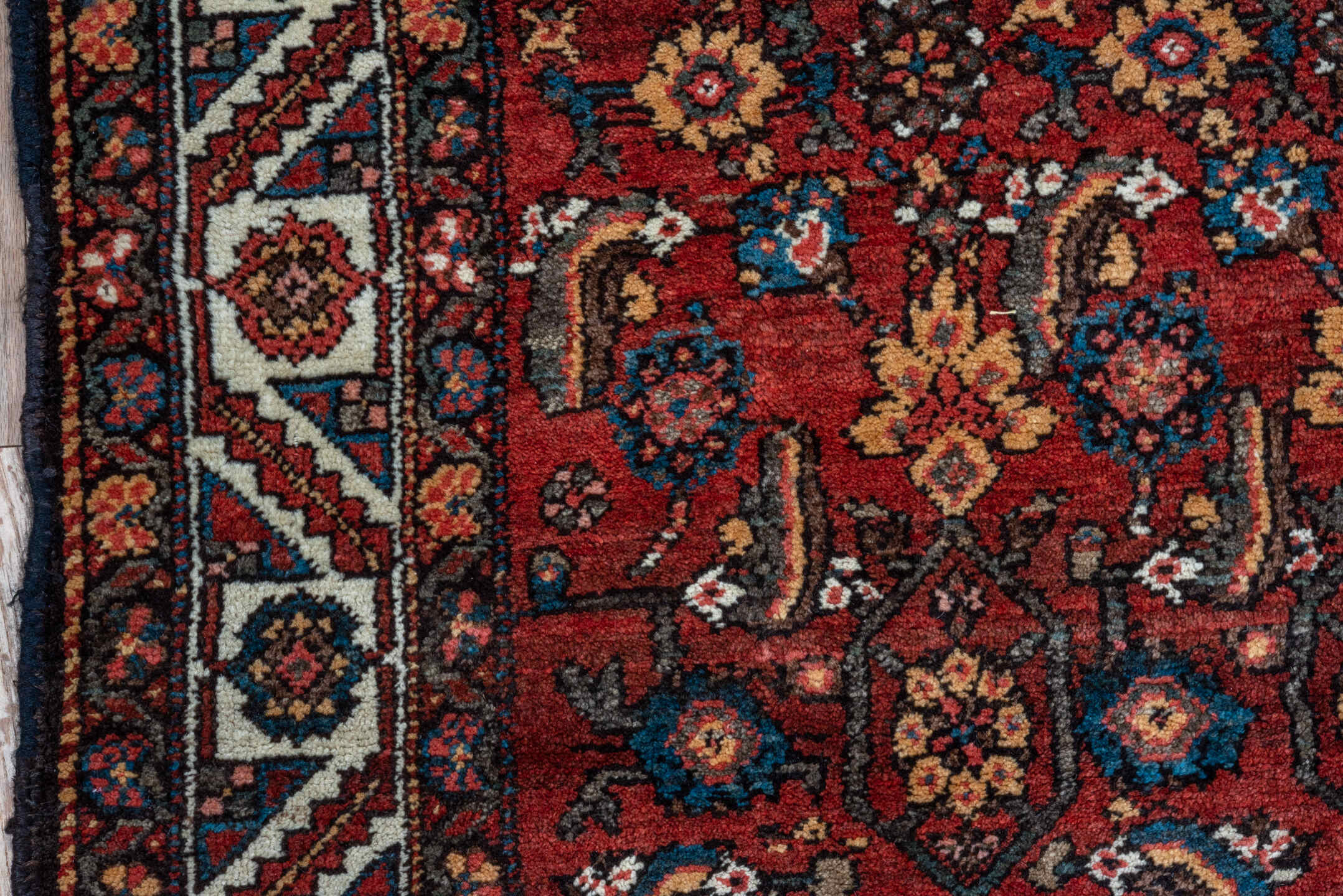 4' x 6' one-of-a-kind handmade vintage Kurd small size rug. Color palette: red, ivory, indigo, rust, navy, camel, burgundy