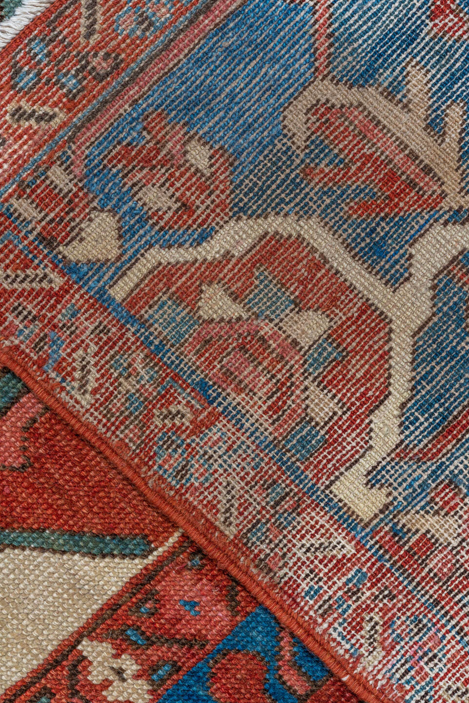 10' x 15' one-of-a-kind handmade vintage Serapi rug. Color palette: rust, sky blue, ivory, crimson, slate, rose, navy