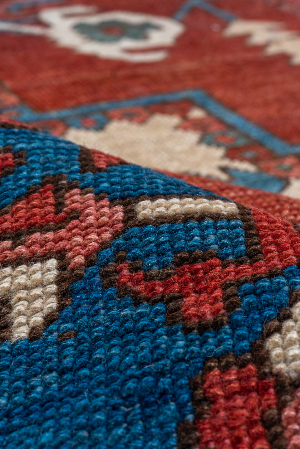 10' x 15' one-of-a-kind handmade vintage Serapi rug. Color palette: rust, sky blue, ivory, crimson, slate, rose, navy