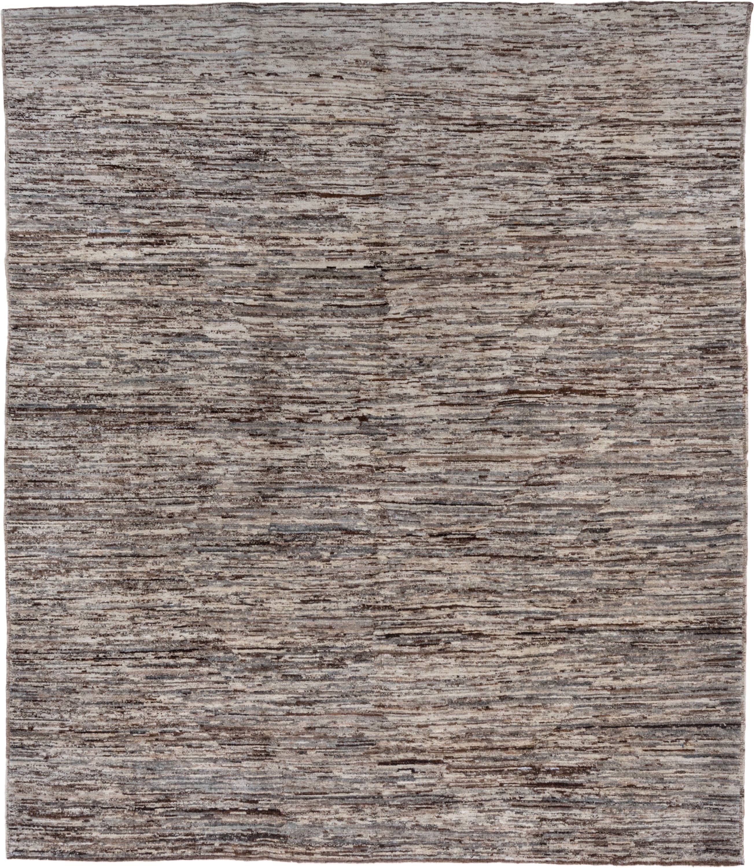 8' x 9' one-of-a-kind handmade vintage Tulu rug. Color palette: taupe, brown, ivory, gray, charcoal, beige, black
