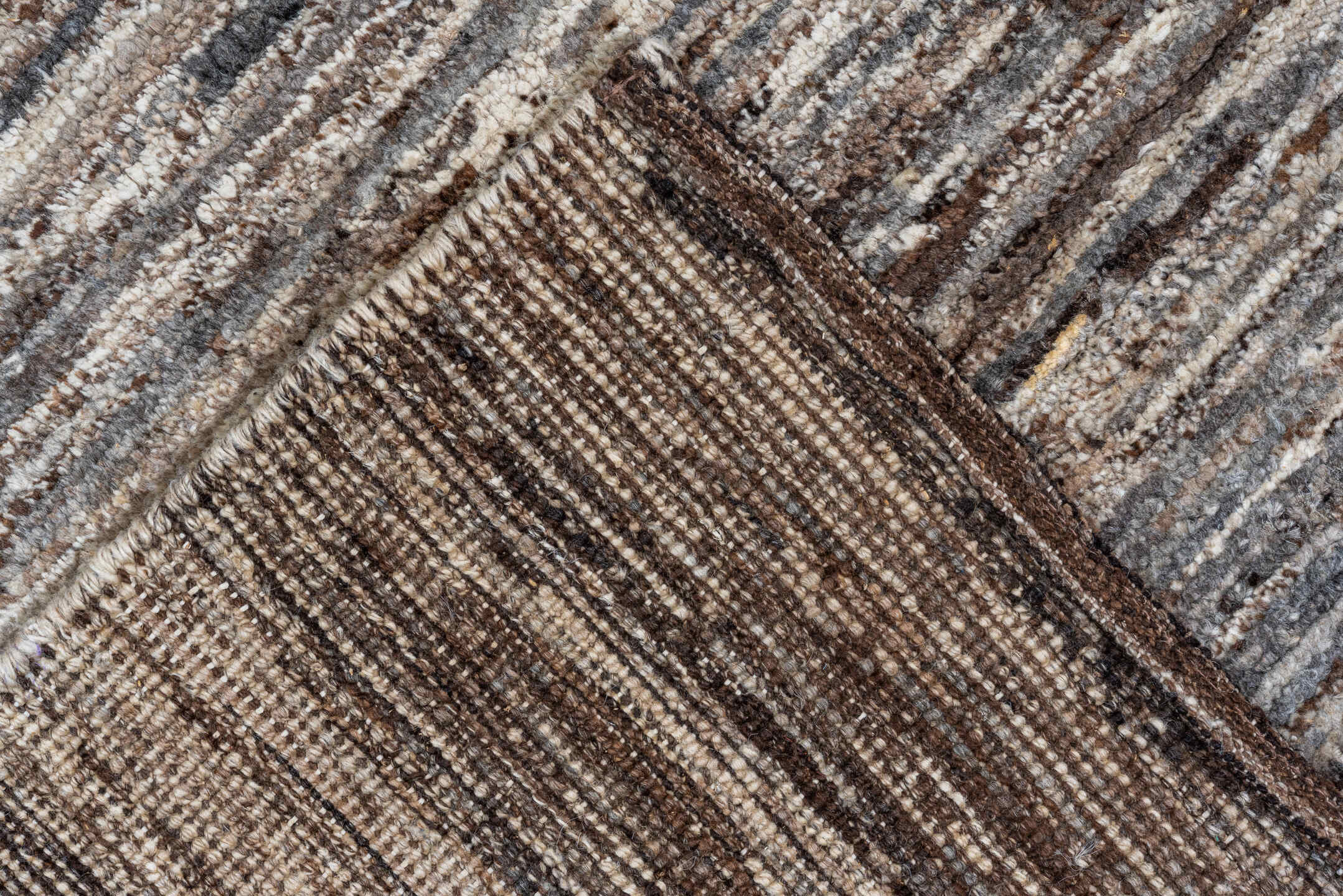 8' x 9' one-of-a-kind handmade vintage Tulu rug. Color palette: taupe, brown, ivory, gray, charcoal, beige, black