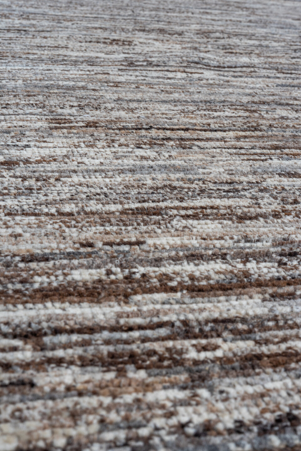 8' x 9' one-of-a-kind handmade vintage Tulu rug. Color palette: taupe, brown, ivory, gray, charcoal, beige, black