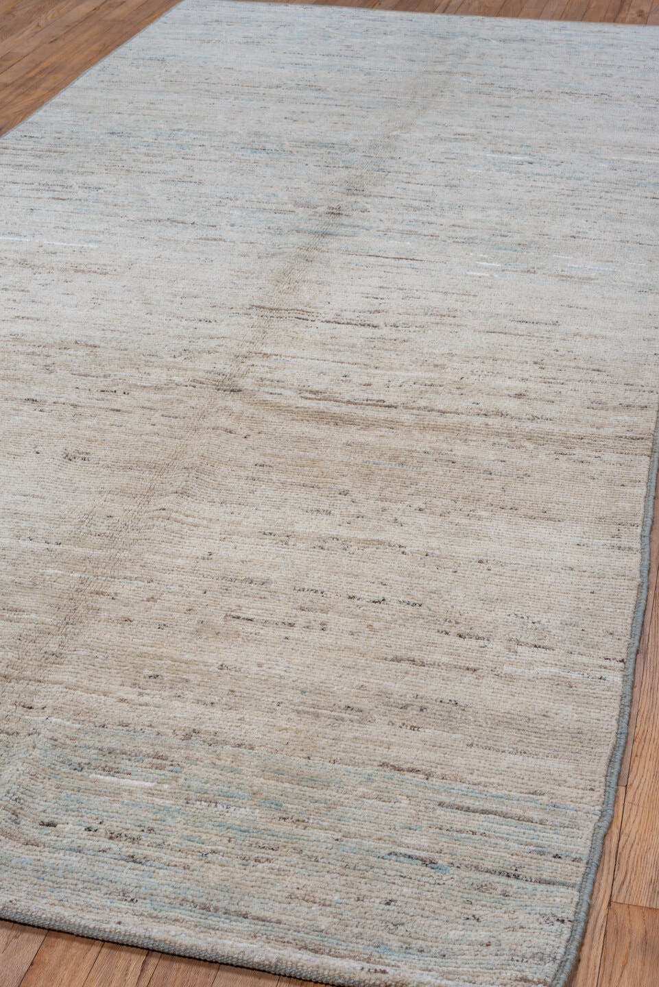 5' x 11' one-of-a-kind handmade vintage Tulu runner rug. Color palette: ivory, pale blue, taupe, gray, cream, light blue